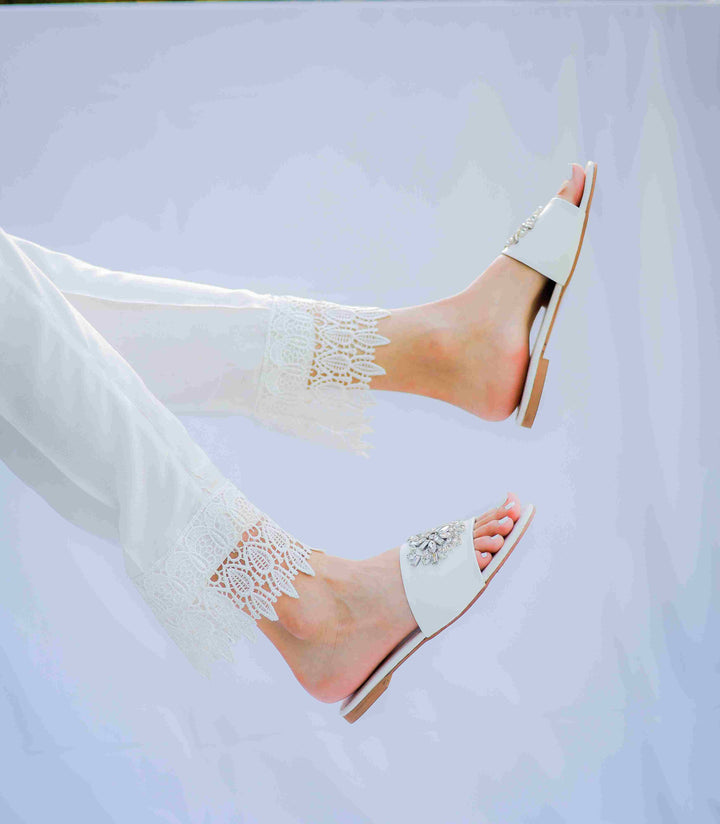Women's Diane - White shoes featuring a smooth synthetic upper, slip-on style, and cushioned footbed for day-to-night wear