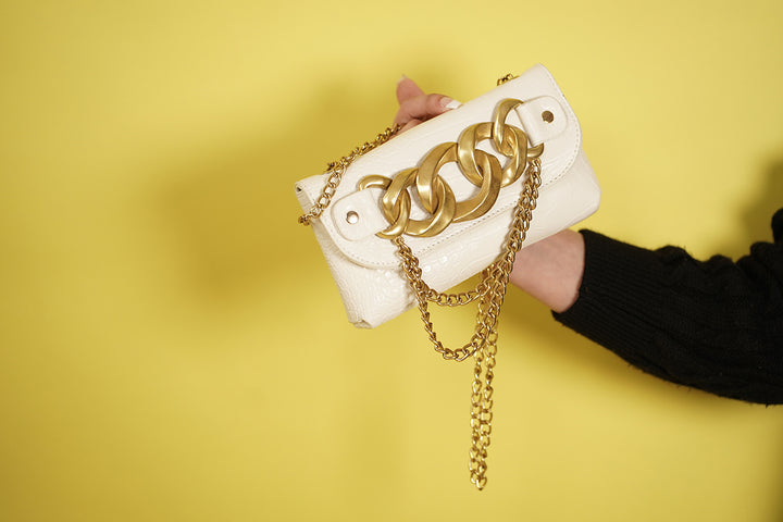 Stylish ladies' Gianni mini bag with a full flap and chain detailing from Rayseen.store